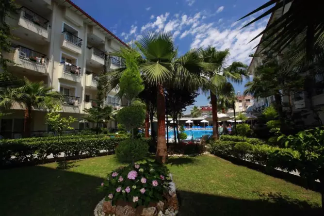 Sun City Apartments & Hotel Side