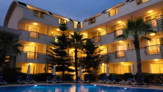 Sun City Apartments & Hotel Side
