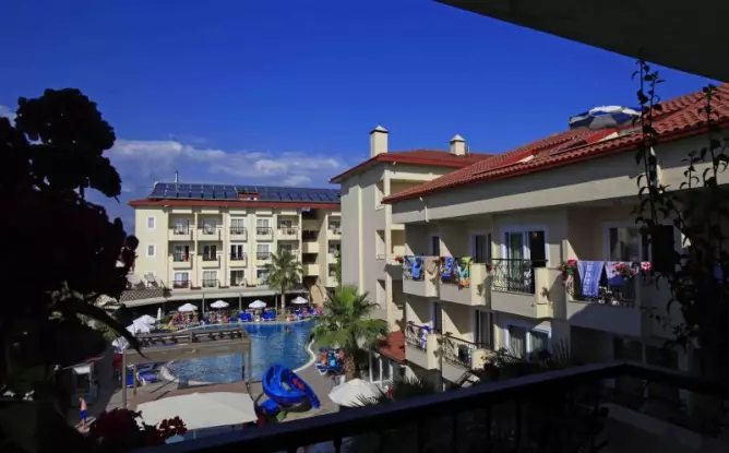 Sun City Apartments & Hotel Side