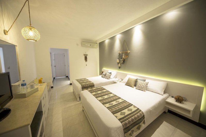 Triple Trouble Side Sea View Room