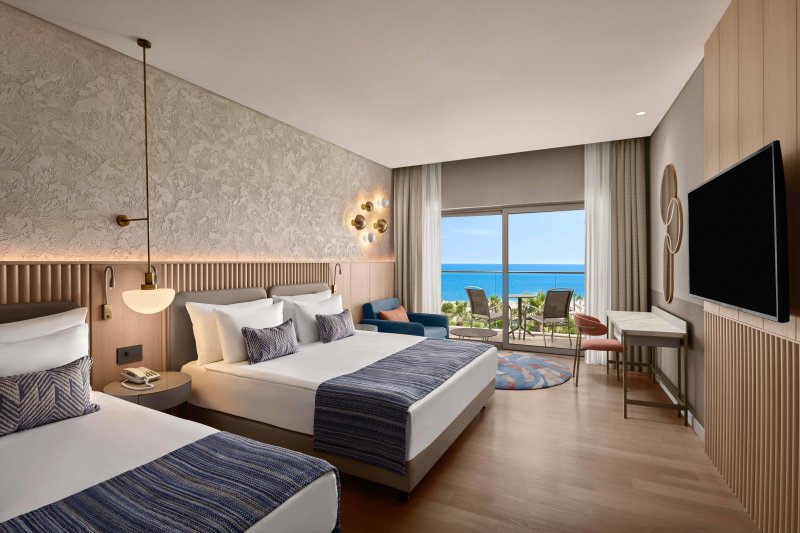 Deluxe kétágyas szoba, pótágyazható, tengerre néző