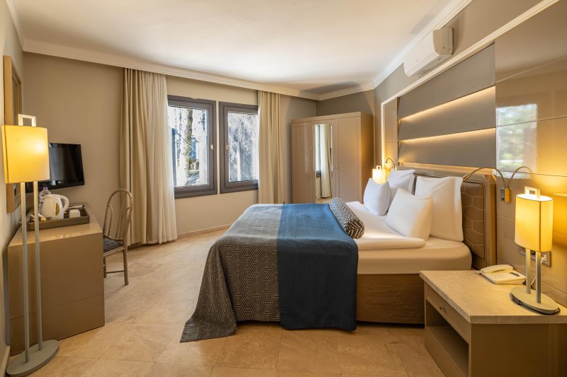 Családi szoba kertre néző kilátással